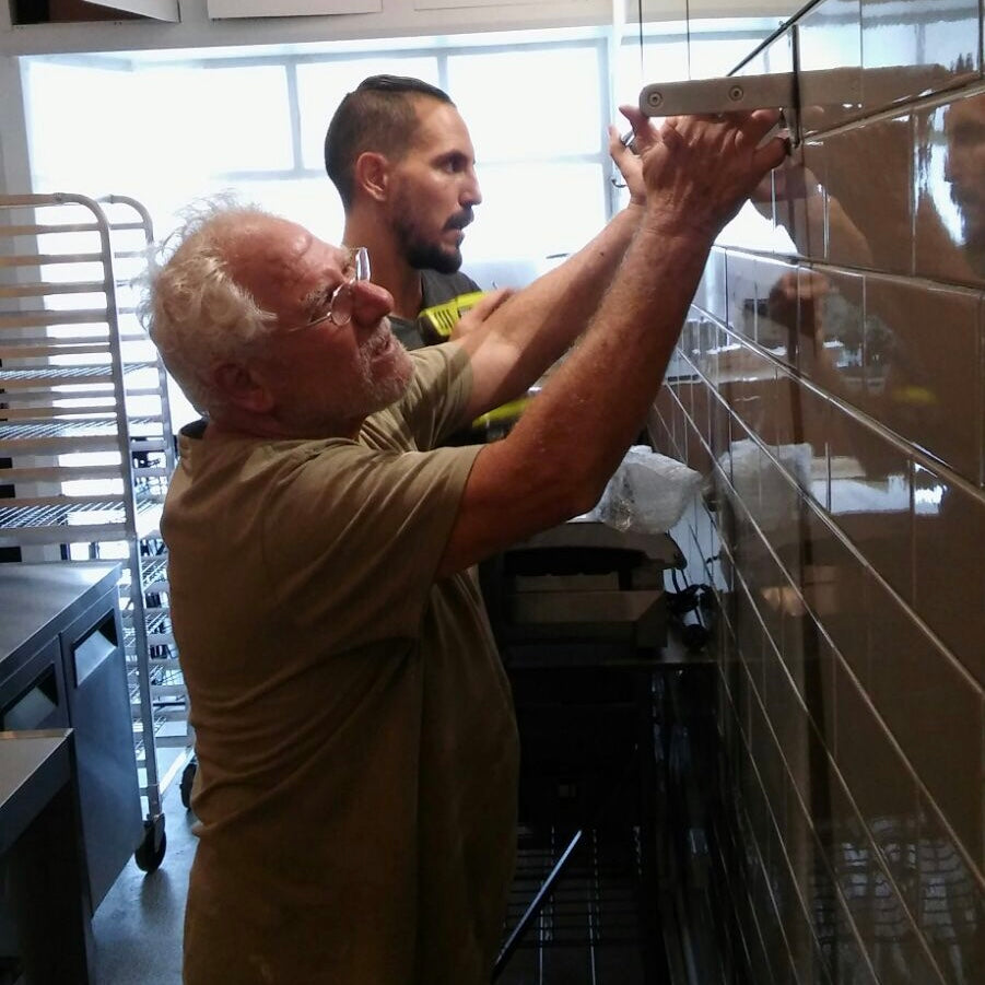 Niko & his Dad fitting out the deli.